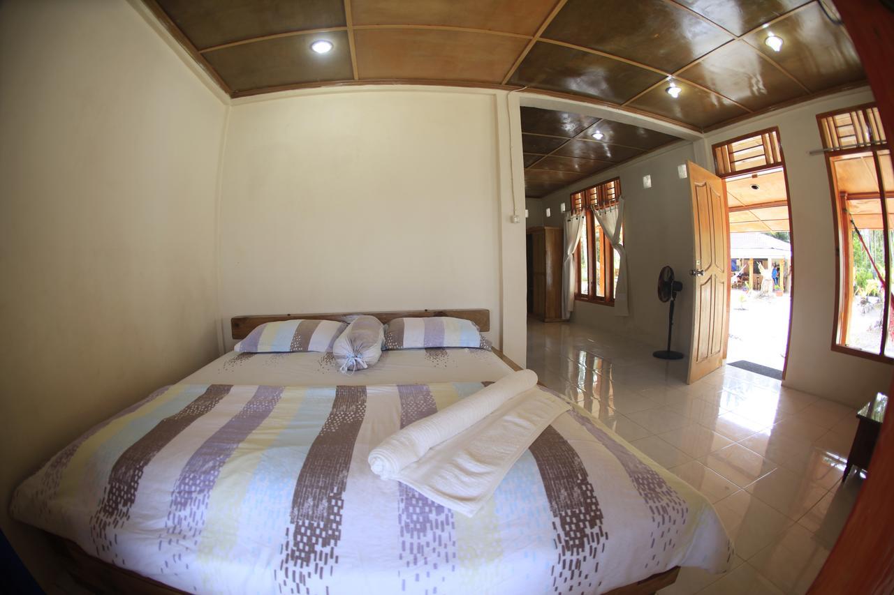 Puri Asu Resort Palau Asu Exteriör bild